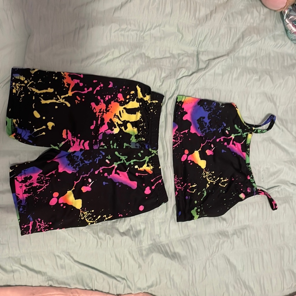 Size 4 girls, gymnastics/dance outfit black with neon paint splatter design